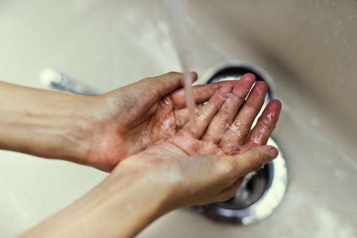 Washing hands in a sterile setting