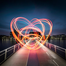 Nordic Edge logo - lIghtning heart on bridge